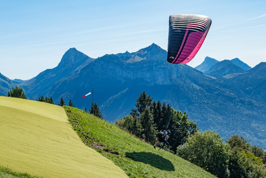 Couple launching on a tandem paragliding flight
